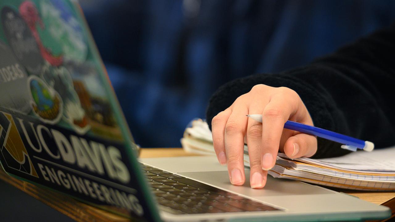 student using laptop 